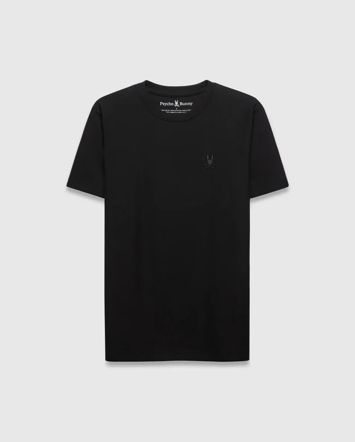 Mens Taylor Pique Tee, a classic fit black t-shirt crafted from pique fabric, featuring a small, tonal embroidered Psycho Bunny skull logo on the left chest.