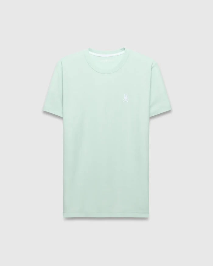 Mens Taylor Pique Tee, a classic fit mint green pique knit t-shirt with a small white embroidered Psycho Bunny skull logo on the left chest and white inner collar trim.