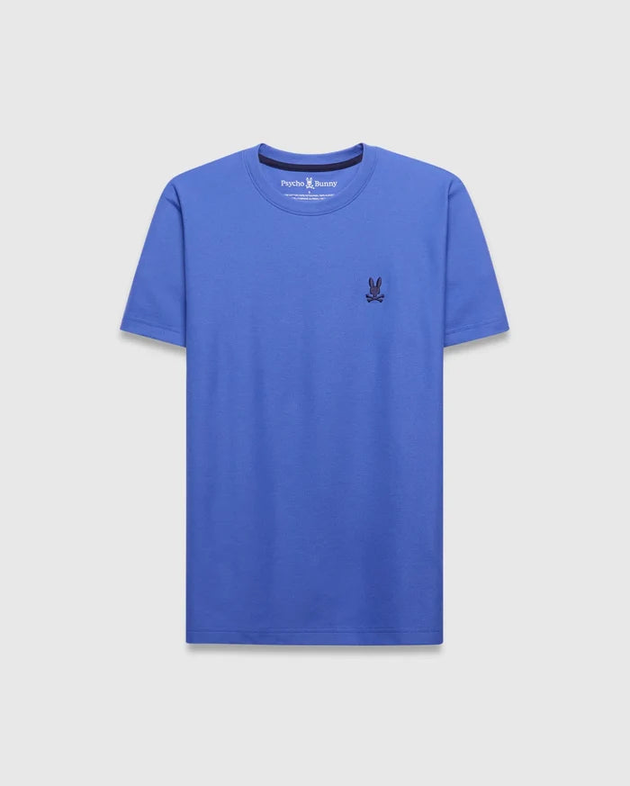 Mens Taylor Pique Tee in vibrant cobalt blue, classic fit, with a small, dark navy embroidered Psycho Bunny skull logo on the left chest.