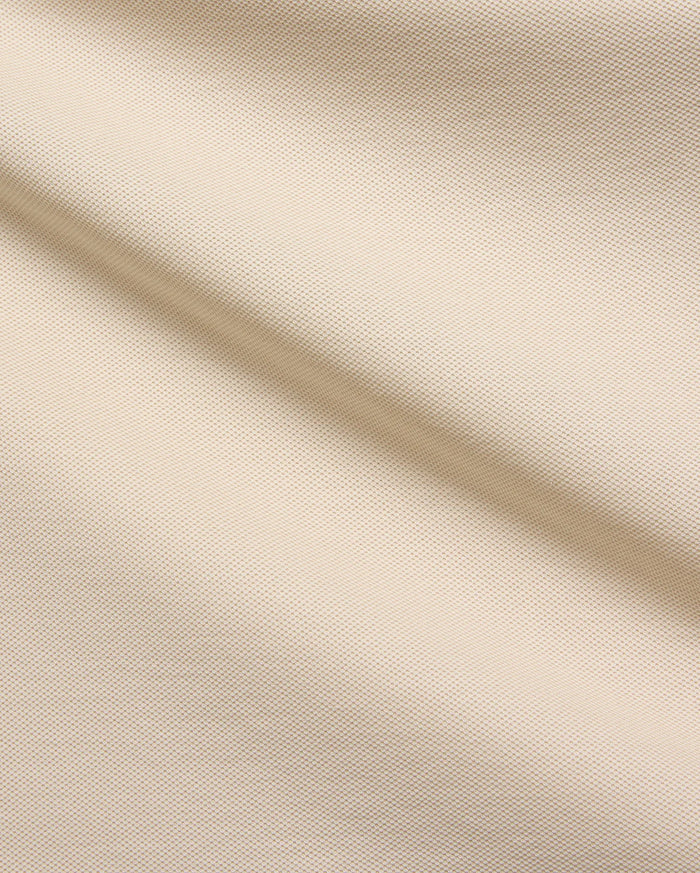 Mens Taylor Pique Tee in a premium light beige pique fabric, showcasing its refined texture and subtle weave, perfect for elevated casual wear and modern streetwear style.