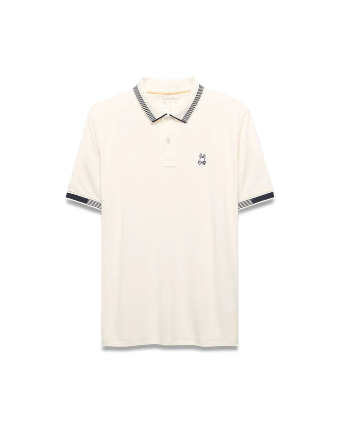 Mens Timmy Interlock Polo, cream interlock knit with navy and white striped collar and cuffs, featuring a small embroidered Psycho Bunny skull logo on the left chest.