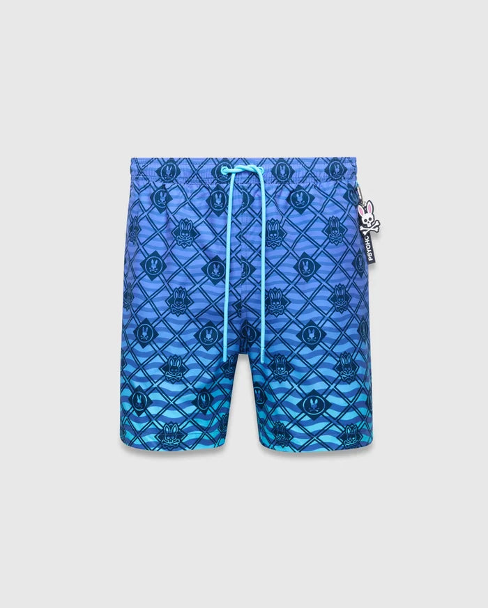 Mens Tobias Gradient Swim Trunk in a blue to teal gradient, featuring an all-over geometric diamond pattern with wavy lines and repeated small Psycho Bunny skull logos, finished with a light blue drawstring and side tag.