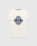Mens Tobias Graphic Tee, a cream classic fit jersey t-shirt with a large central navy blue Psycho Bunny skull and crossbones logo inside a diamond graphic, featuring Psycho Bunny text.