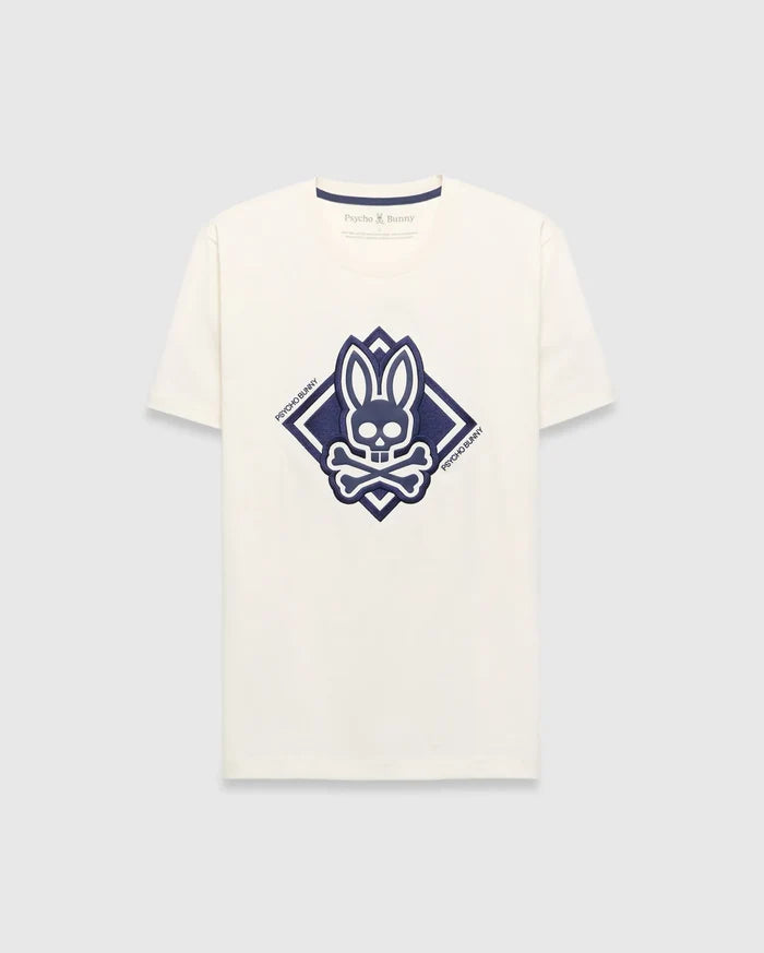 Mens Tobias Graphic Tee, a cream classic fit jersey t-shirt with a large central navy blue Psycho Bunny skull and crossbones logo inside a diamond graphic, featuring Psycho Bunny text.
