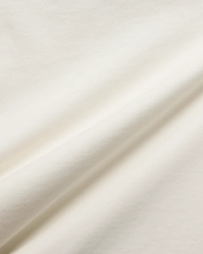 Mens Tobias Graphic Tee in ecru, crafted from soft jersey knit fabric. This premium Psycho Bunny streetwear features a distinctive graphic and the iconic bunny skull logo.