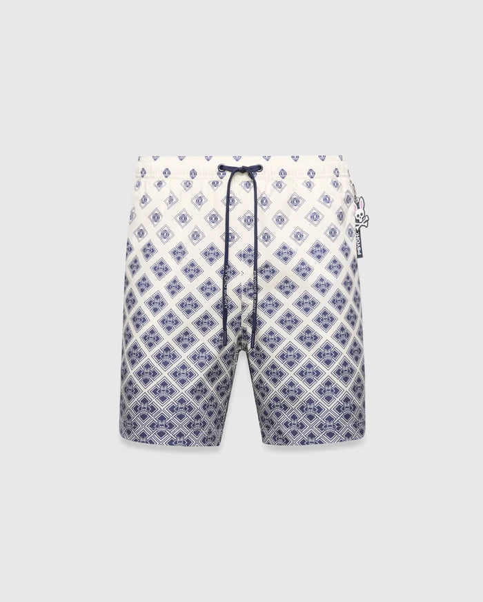Mens Tobias Swim Trunk, cream with a navy blue gradient geometric pattern subtly integrating the Psycho Bunny skull logo, featuring a navy drawstring and logo zipper pull.