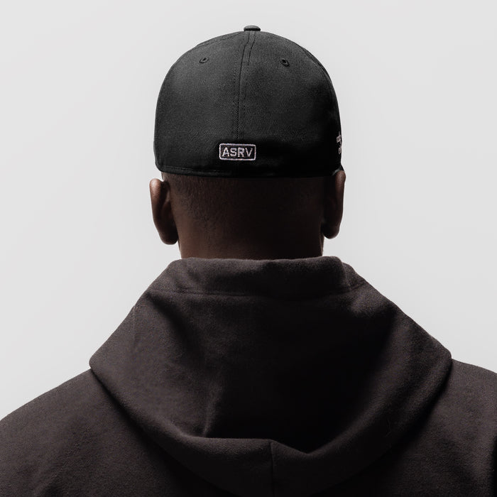 Black New Era 59Fifty cap with ASRV patch, worn by model from behind