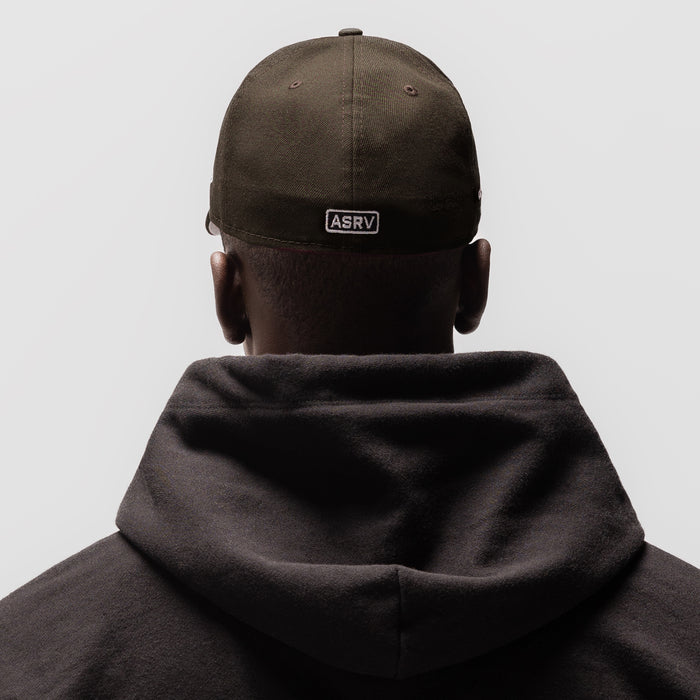 New Era 59Fifty Low Profile Hat in Dark Earth worn by model from back view