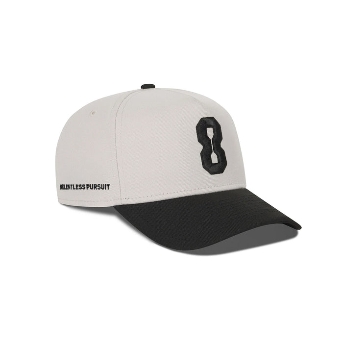 flatlay New Era 9Forty A-Frame Hat in stone and black with number 8 emblem, front view