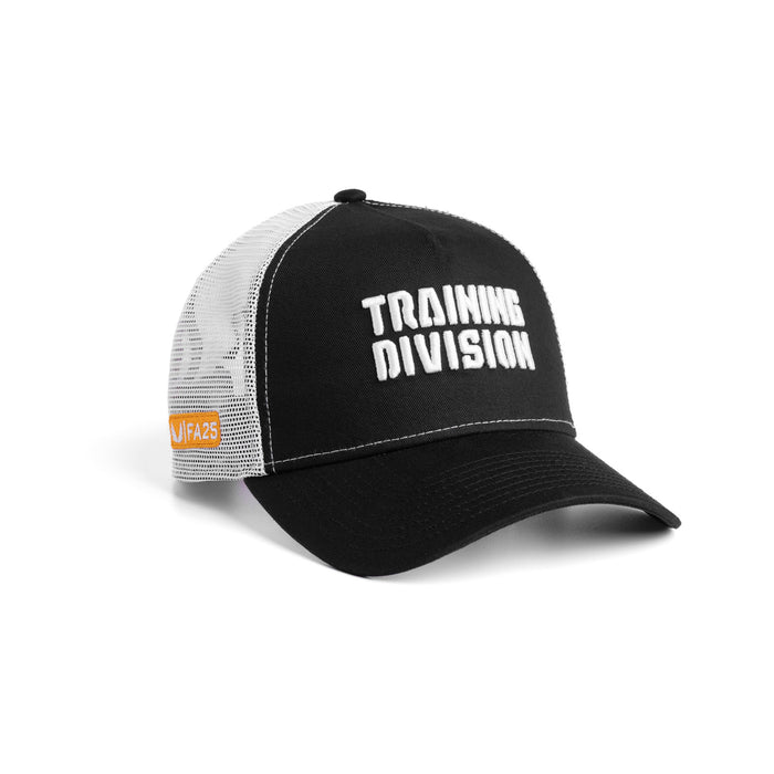 Flatlay of New Era 9Forty A-Frame Trucker Hat in black and white with 'Training Division' text, angled side view
