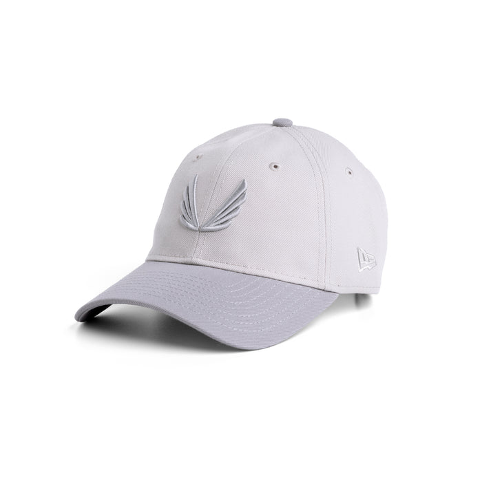 flatlay New Era 9Twenty Strapback Hat in stone and grey two-tone, front view