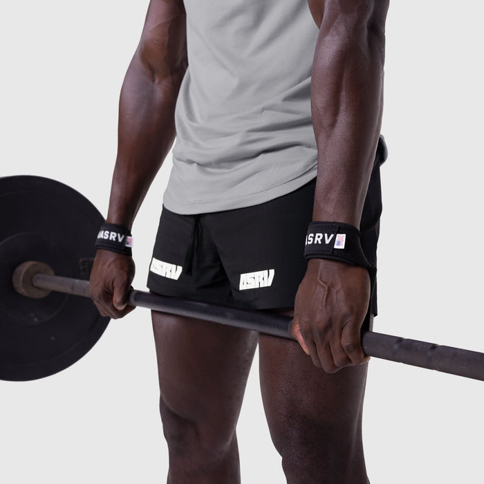 Padded Lifting Straps in black worn on wrists while holding barbell, front view