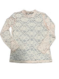 A long-sleeve lace top in pale peach