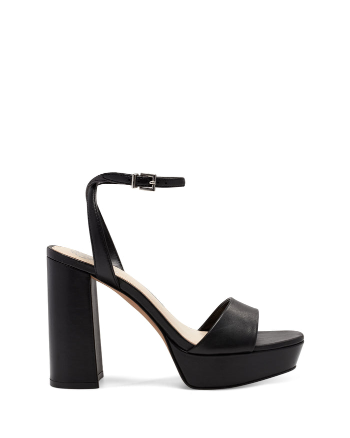 Channeling true ’70s style, the Pendry Platform Sandal by Vince Camuto features a black high-heeled platform design with a thick block heel, open toe, single front strap, and an ankle strap with a small buckle, all shown on a white background.