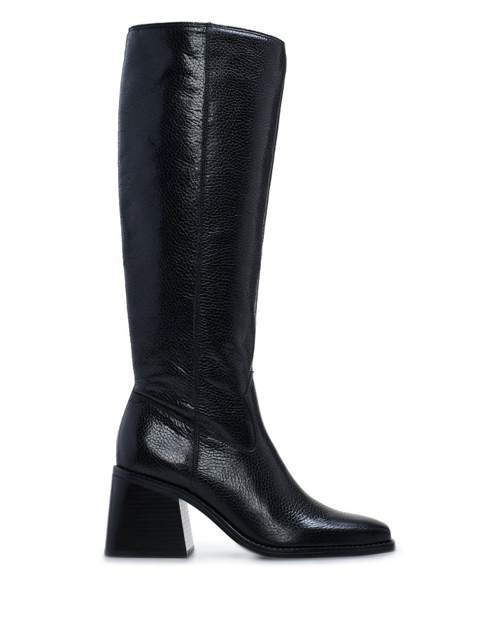 The Vince Camuto Sangeti Boot, a single black knee-high leather boot with a block heel, rounded toe, and textured finish, is shown in profile against a white background.