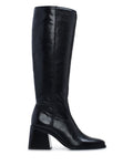 The Sangeti Wide Calf Boot by Vince Camuto is a tall boot crafted from black leather, featuring a mid-height block heel, textured finish, and rounded toe, shown in side profile against a white background.