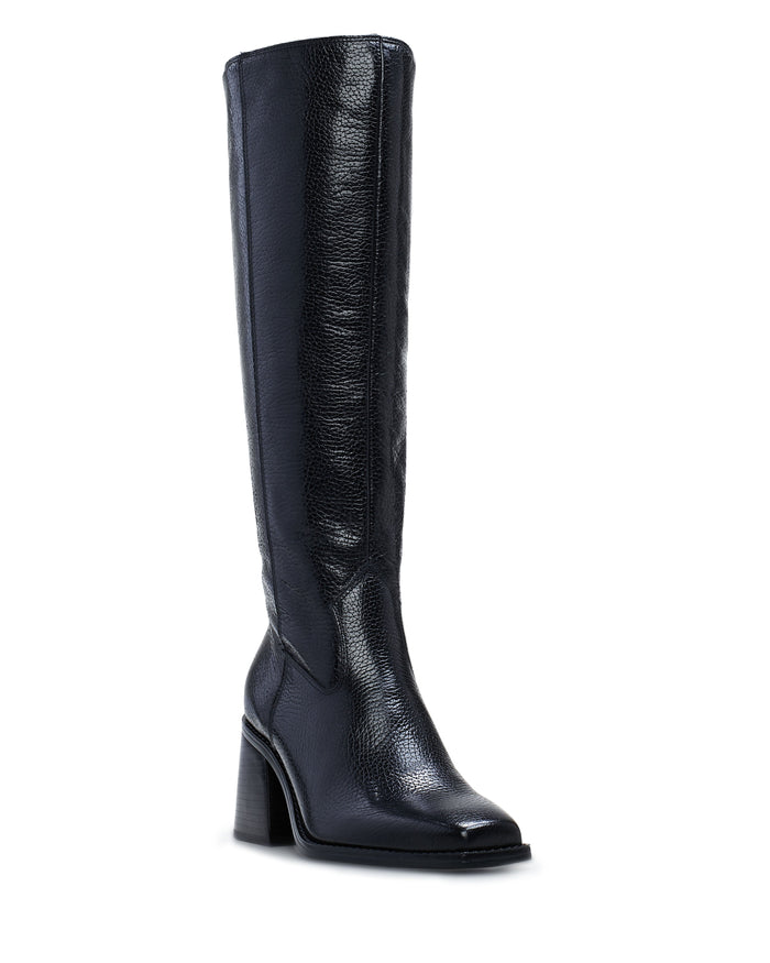 A single tall black Sangeti Narrow Calf Boot by Vince Camuto, crafted from textured leather with a rounded toe and a chunky mid-height block heel, is displayed against a white background—an iconic design for enduring style.