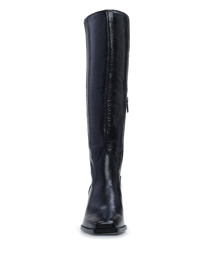 A black knee-high leather wide calf boot from Vince Camuto, called the Sangeti Wide Calf Boot, is displayed from the front against a white background, highlighting its elegant block heel design.