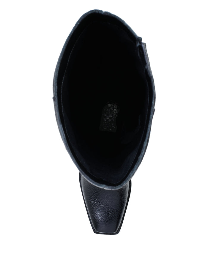 Top view of a Vince Camuto Sangeti Wide Calf Boot in black leather with a square toe, displaying the opening and part of the interior sole. This block heel boot blends classic Western style with modern comfort.