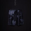 SM'21 Tie Dye Mesh Liner Short in navy, hanging from chain against black background