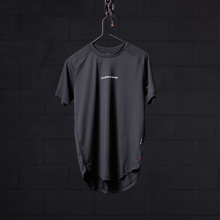 SM'22 Established Tee in charcoal gray, displayed on hanger against dark background