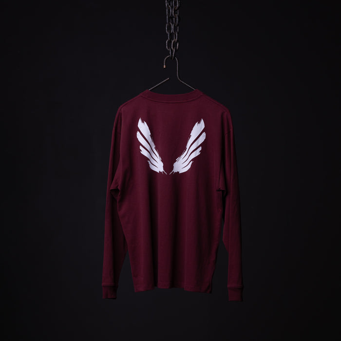 SM'22 Graphic Long Sleeve in maroon with white wing design on back, displayed on hanger
