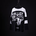 SM'23 long-sleeve jersey in black and white, hanging on hanger with 'Valley of Fine' graphic