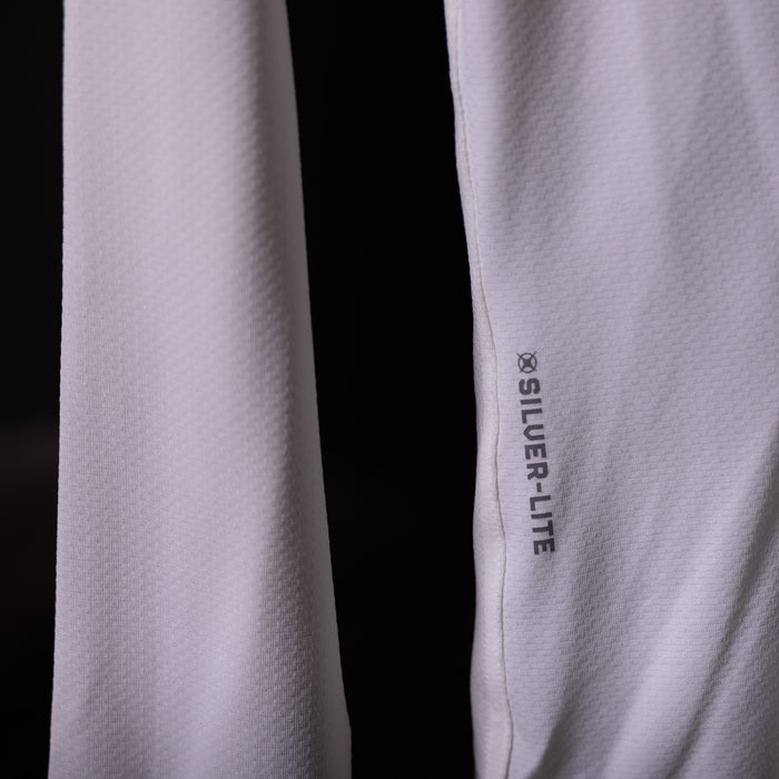 SP'20 Long Sleeve Shirt in lavender and black, detail shot showing Silver-Lite branding on sleeve