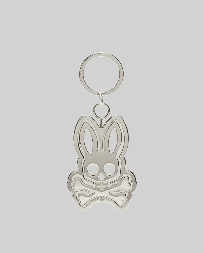 Silver metallic Spinning Bunny Keychain featuring the iconic Psycho Bunny skull and crossbones logo design with a hollowed-out center, attached to a classic key ring.