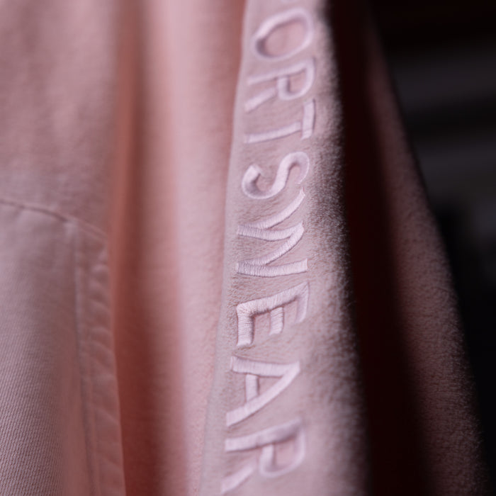 SS'20 Reverse Weave Hoodie in mauve, embroidered logo detail closeup