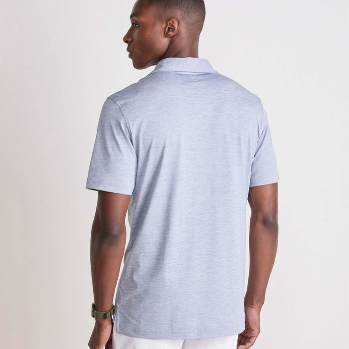 Vineyard Vines Men's Short Sleeve Polo in Hammerhead, sizes S-XXL. Back view of a man wearing the light blue polo with a flat collar and short sleeves. Color is a muted blue.