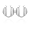 A pair of Vince Camuto Stacked Link Hoop Earrings featuring a ridged, domed design and a sleek silvertone finish, showcased against a white background with a subtle reflection below.