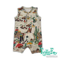 Children's romper with cowboy and desert pattern on a white background, branded 'The Twisted Filly'.
