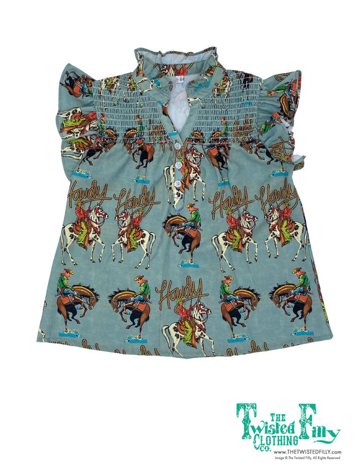 Children's shirt with cowboy print and 'The Twisted Filly' branding on a white background