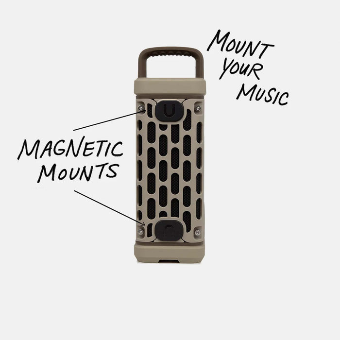 Side view of the tan Turtlebox Ranger speaker showing magnetic mounts labeled “Mount Your Music” and “Magnetic Mounts.”