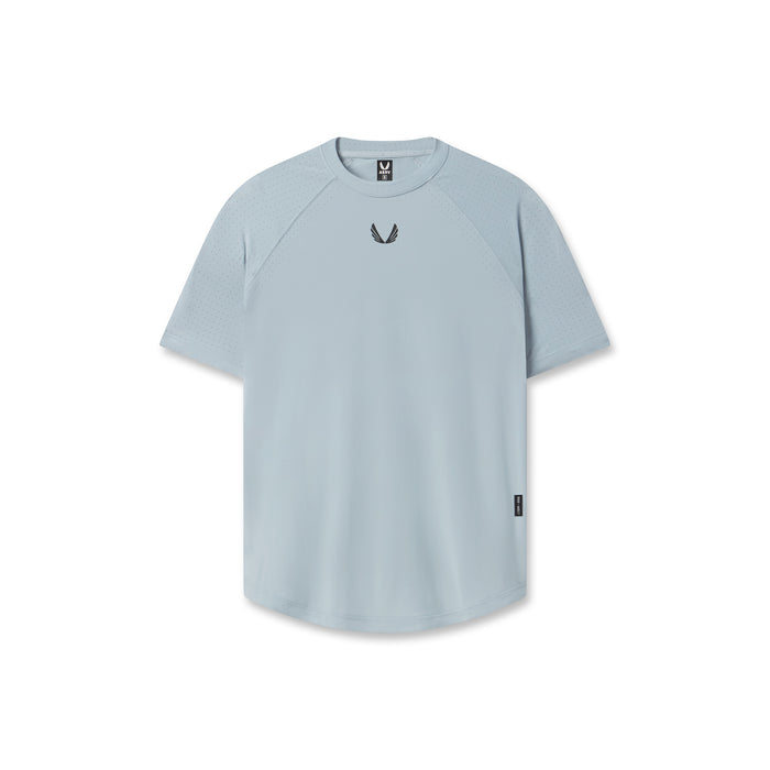 Flatlay of W017 Laser-Vent Established Tee in light sky, front view