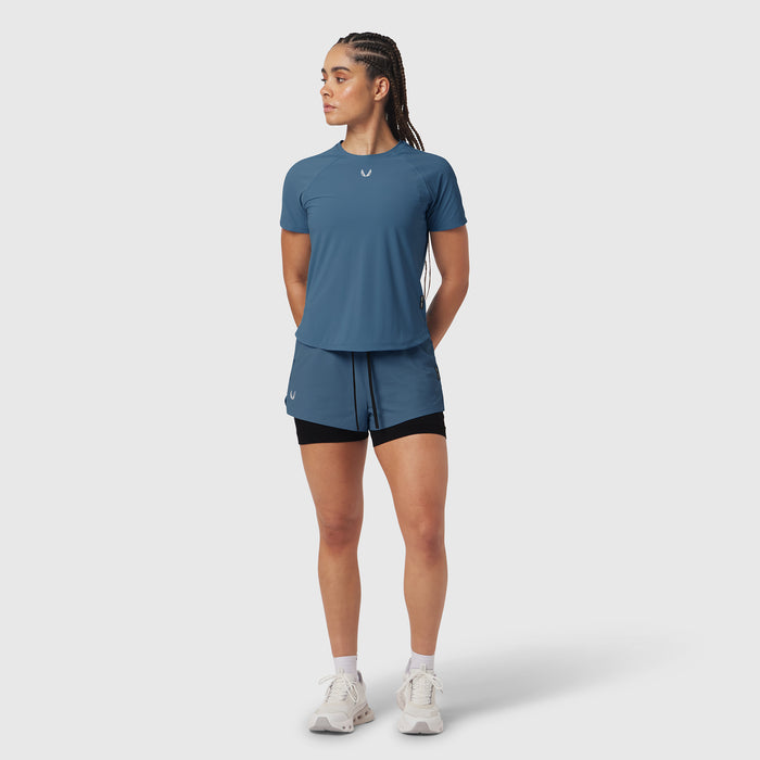W017. Laser-Vent™ Established Tee in storm blue worn with matching shorts, front view