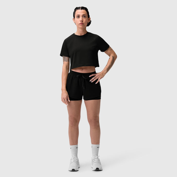 Black AeroSilver cropped tee worn with black shorts and white socks, front view on model