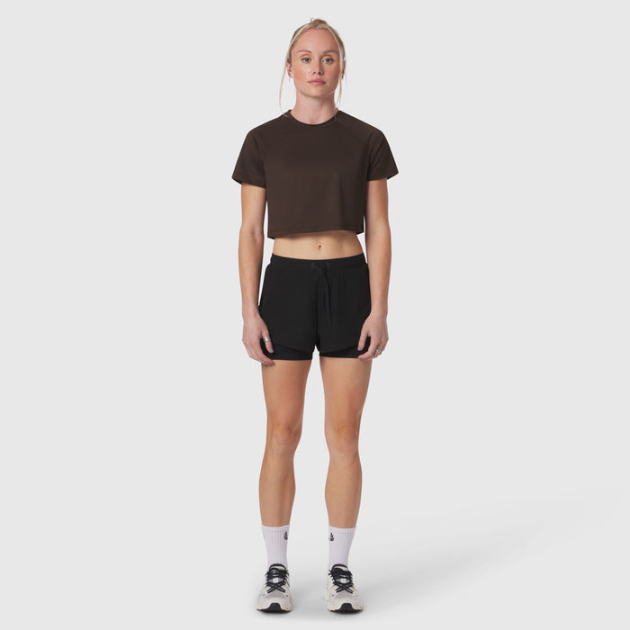 AeroSilver Cropped Tee in dark earth worn with black shorts, front view