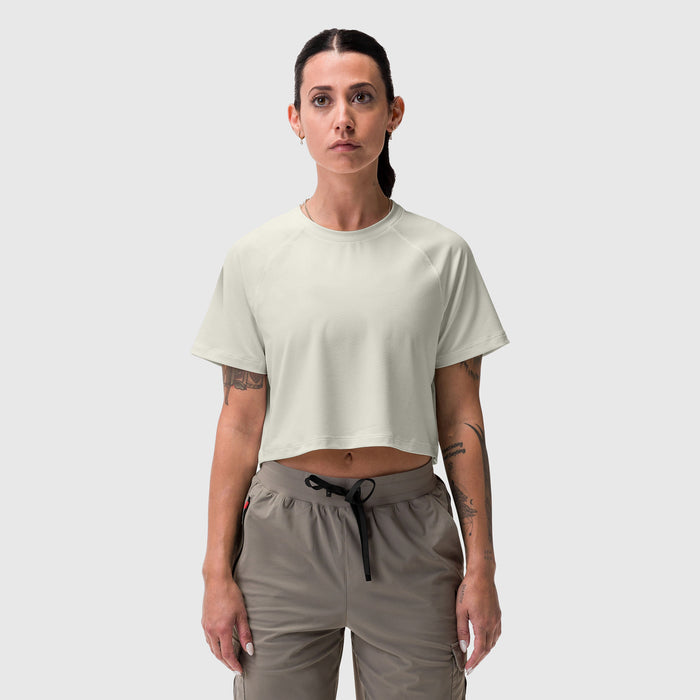 AeroSilver® cropped tee in ivory cream, worn with taupe joggers, front view