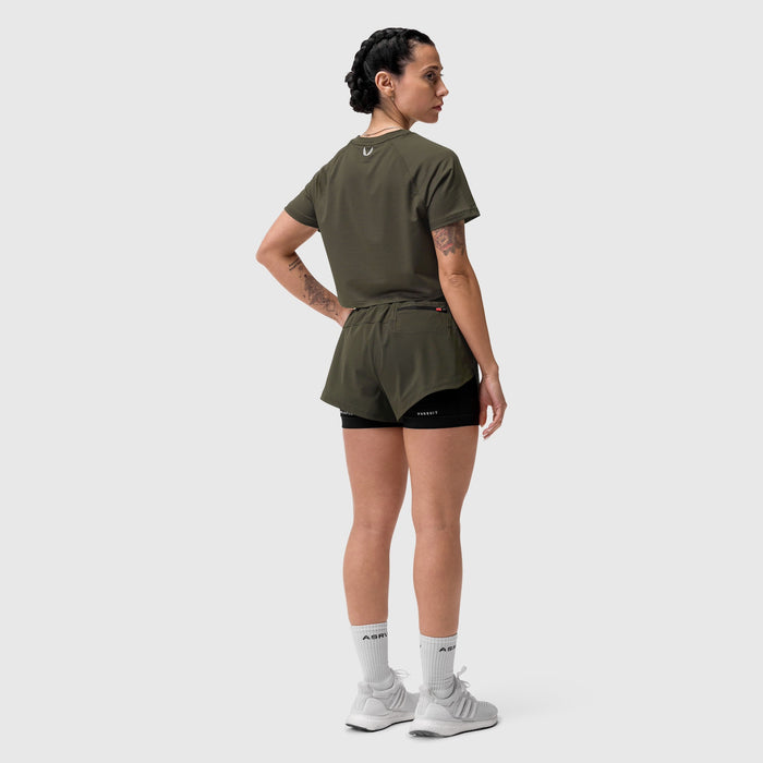 AeroSilver cropped tee in olive worn with black shorts, rear view