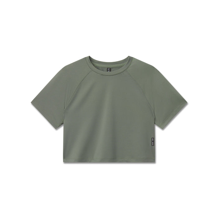 Flatlay of AeroSilver® Cropped Tee in sage green, front view
