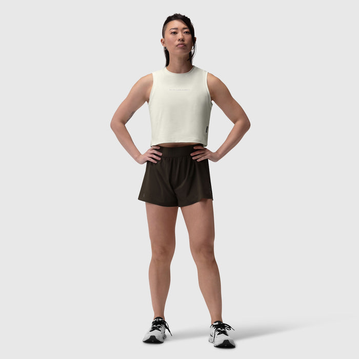 AeroSilver Tank Top in ivory cream worn with black shorts, front view on model
