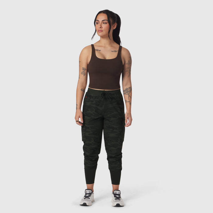 Dark brown LYCRA® 2-in-1 tank top worn with camo joggers, front view on model