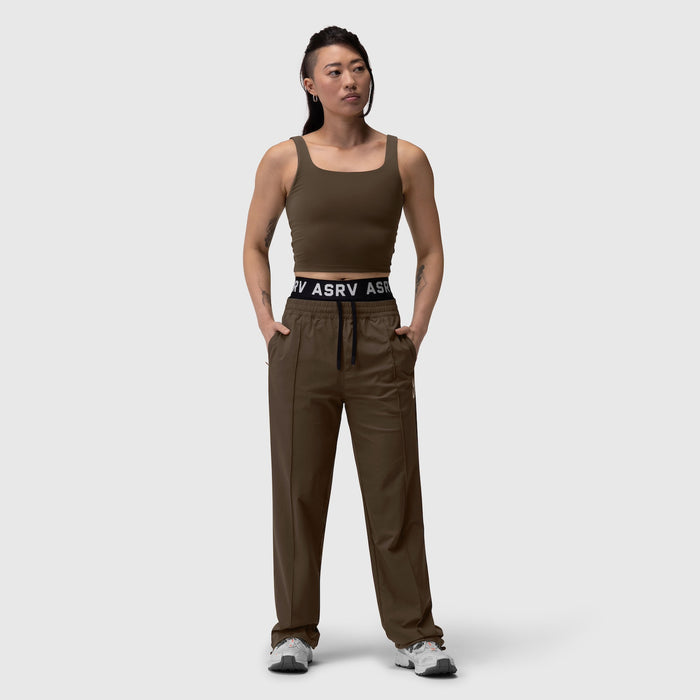 W022 LYCRA® 2-in-1 Tank Top in Dark Earth, worn by model with matching pants, front view