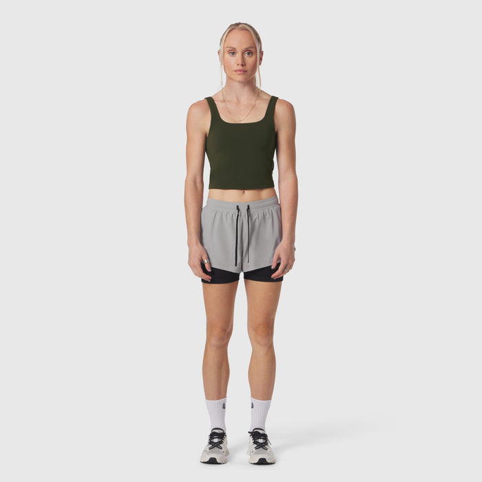 W022 LYCRA® 2-in-1 Tank Top in olive worn with grey shorts, front view