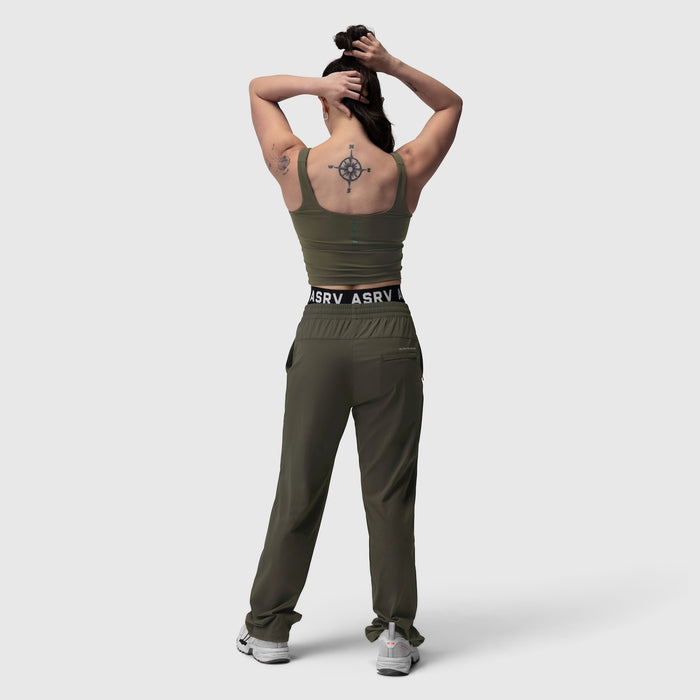 W022 Lycra 2-in-1 tank top in olive, worn by model from back, showing compass tattoo