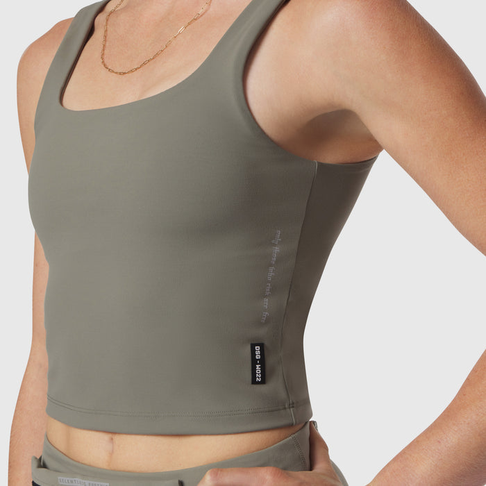 Sage LYCRA 2-in-1 tank top on model, front angled view