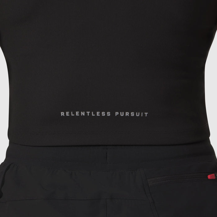 Black Lycra ribbed mockneck tank worn on model, front view showing 'Relentless Pursuit' text