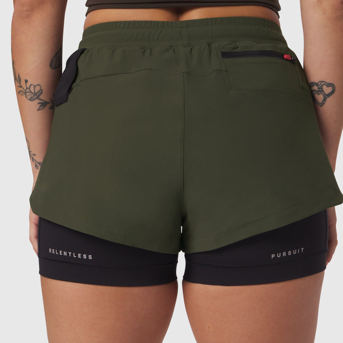 Tetra-Lite Liner Short in olive and black, back view on model